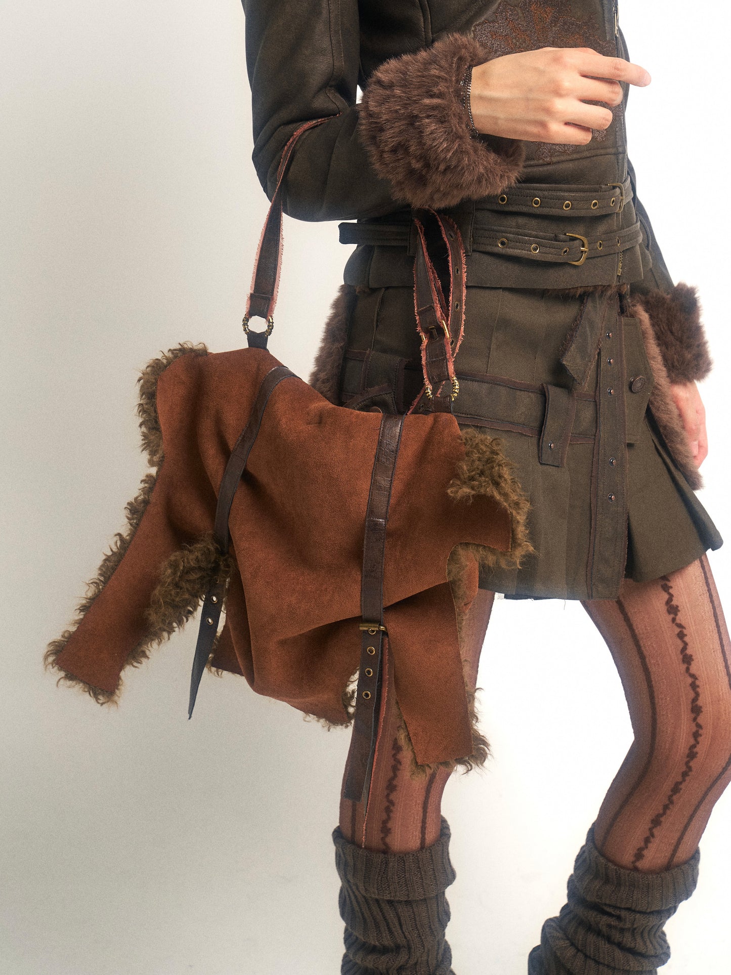 Suede and fur-lined bag.