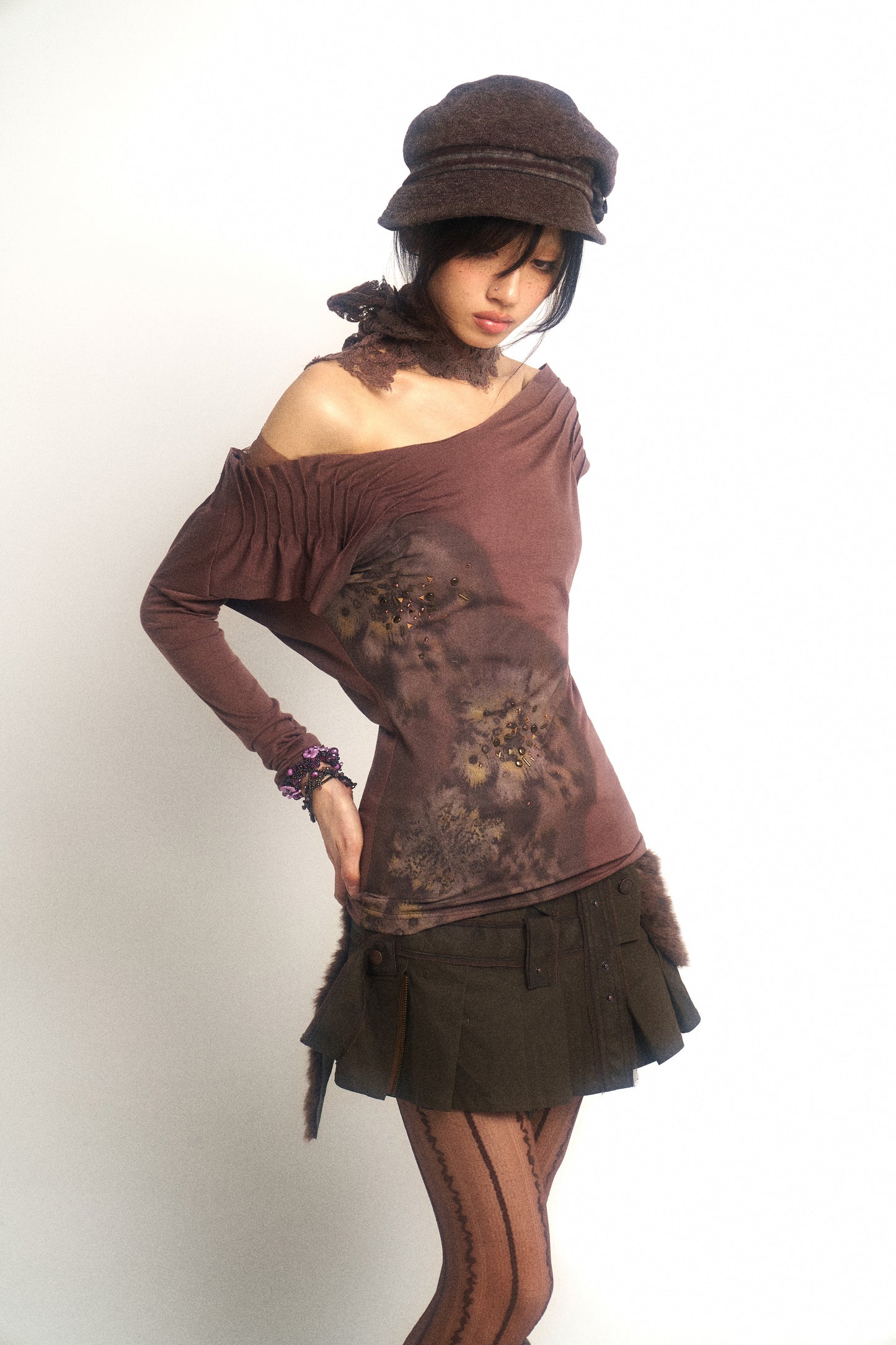 One-piece mini skirt with artificial leather and fur patching