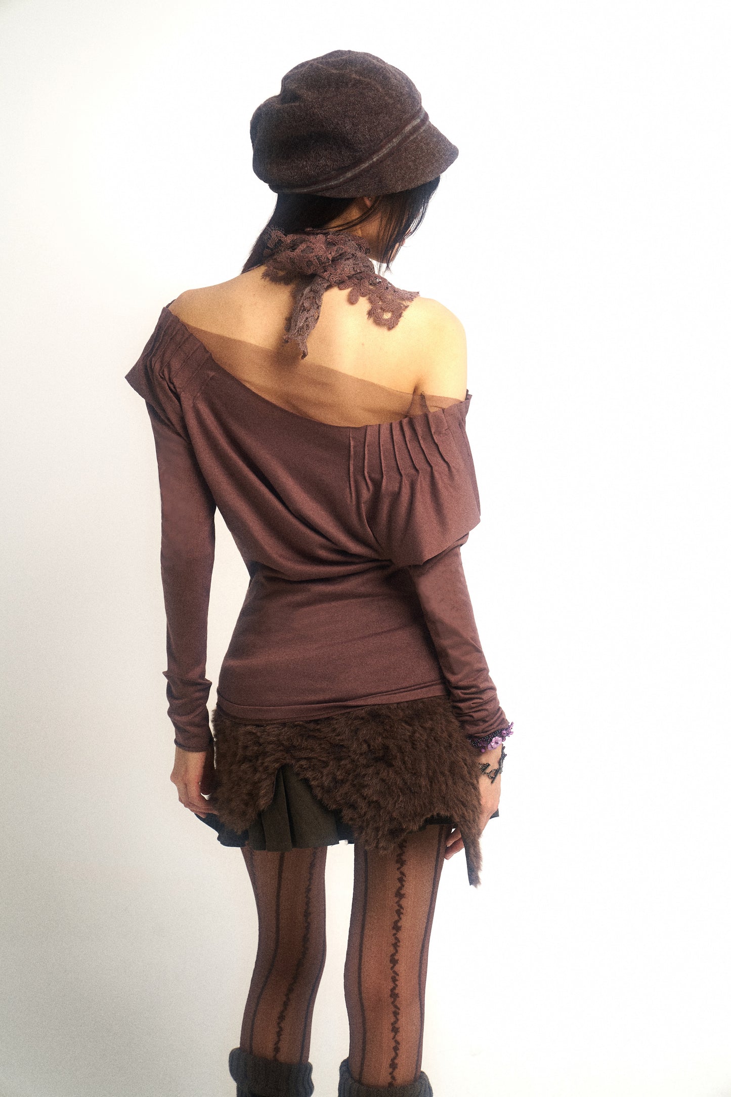 One-piece mini skirt with artificial leather and fur patching