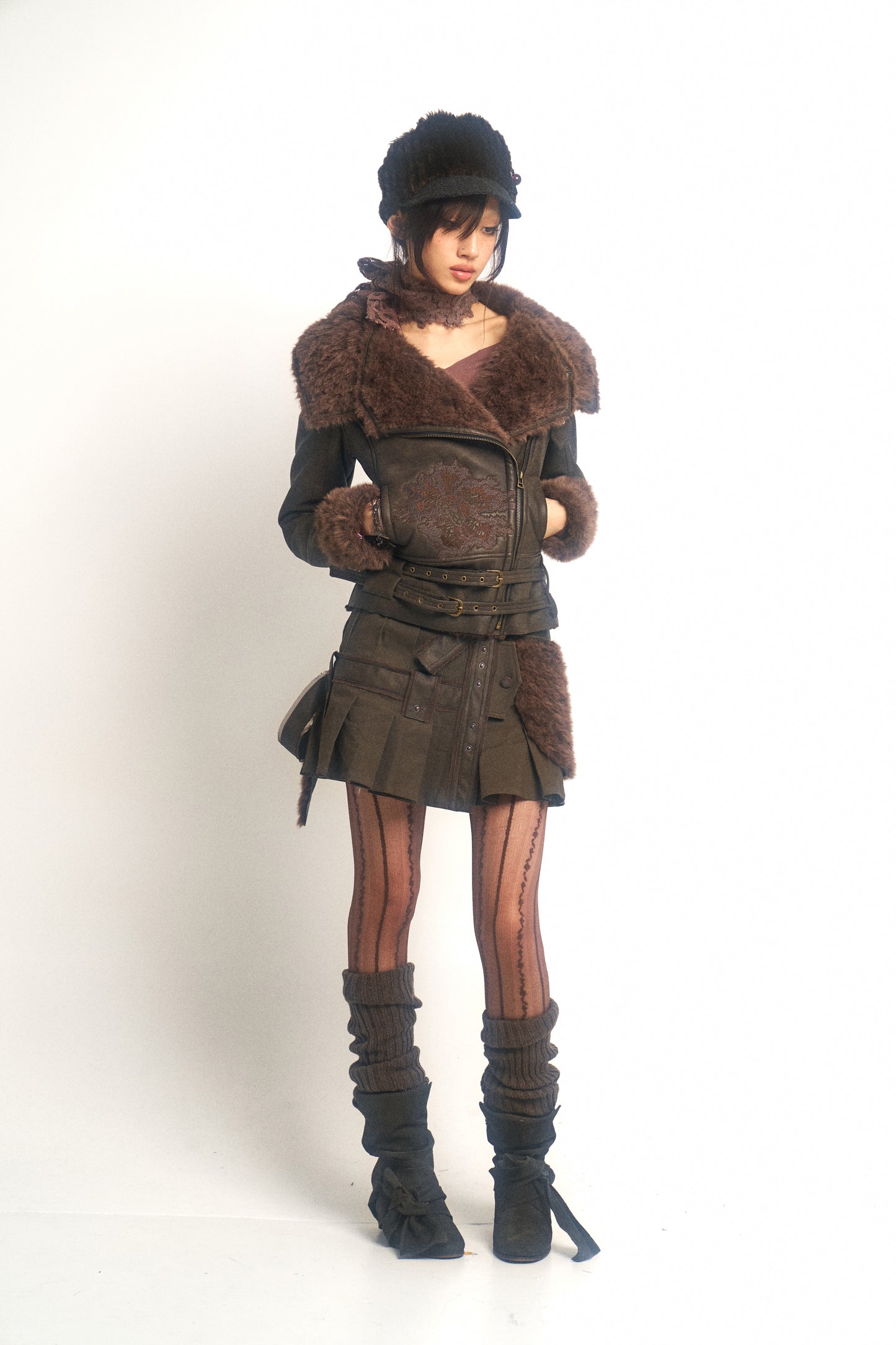 One-piece mini skirt with artificial leather and fur patching