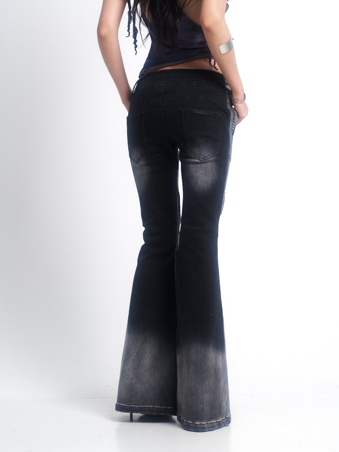 Metallic Rebel Distressed Stretch Jeans with Rips & Slight Flare