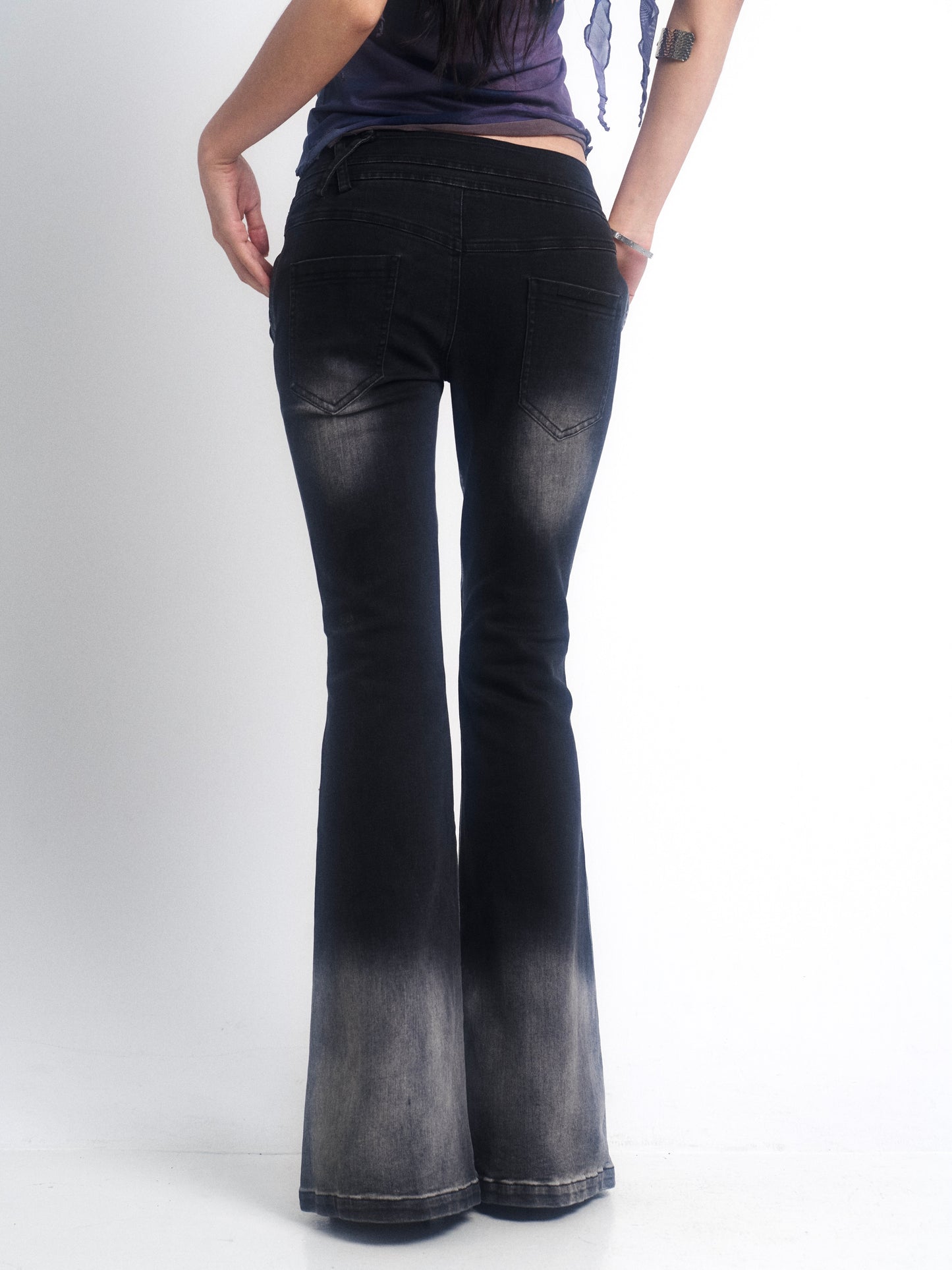 Metallic Rebel Distressed Stretch Jeans with Rips & Slight Flare