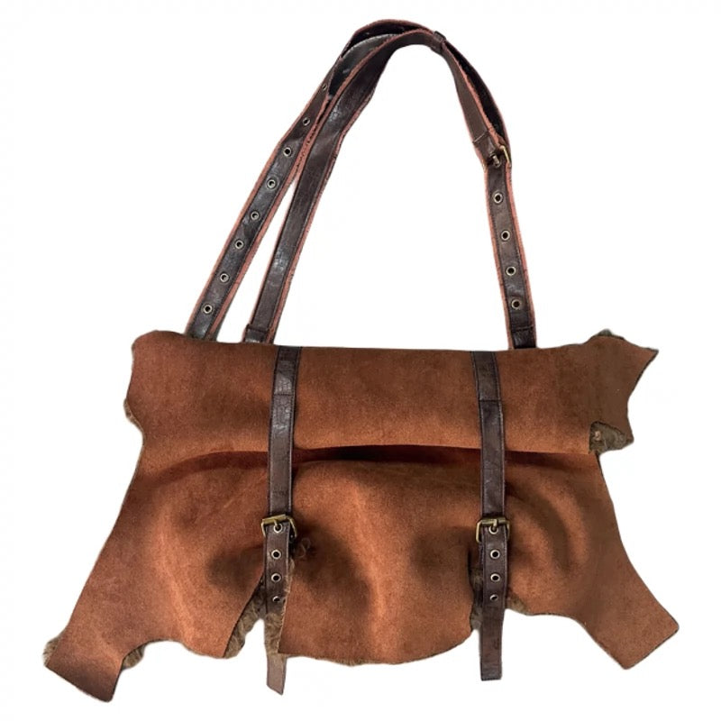 Suede and fur-lined bag.