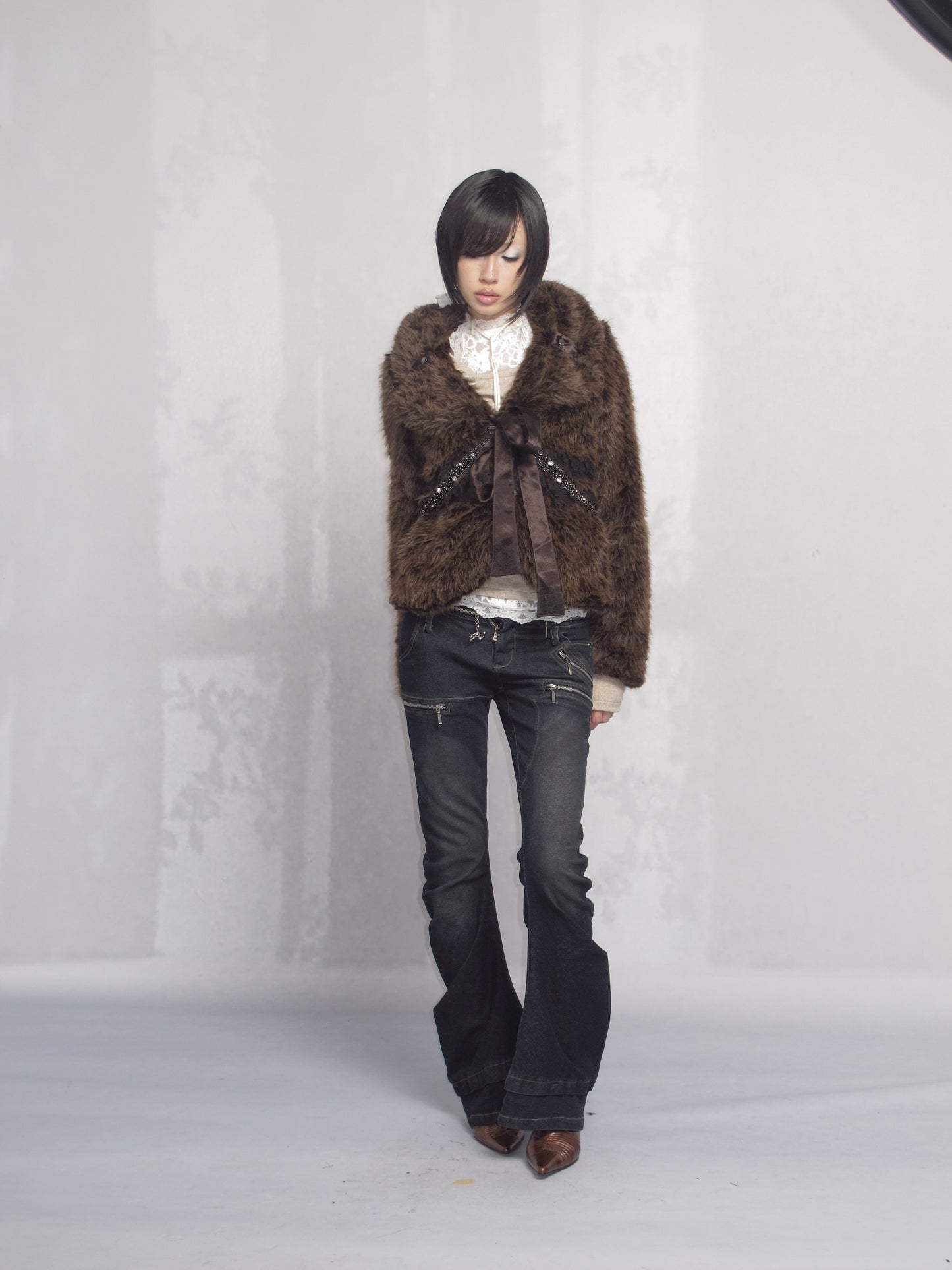 Washed Low-Rise Jeans with Curved Zip Waist Detail